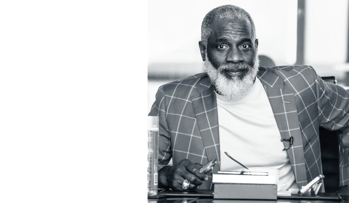 Portrait of Dr. Myron Golden at his desk